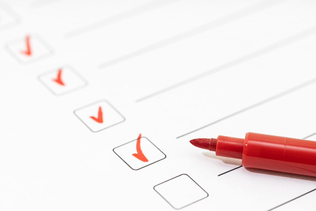 Checkliste mit Stift